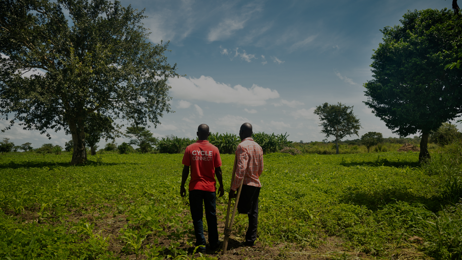 Cycle Connect team and client in a Northern Uganda field