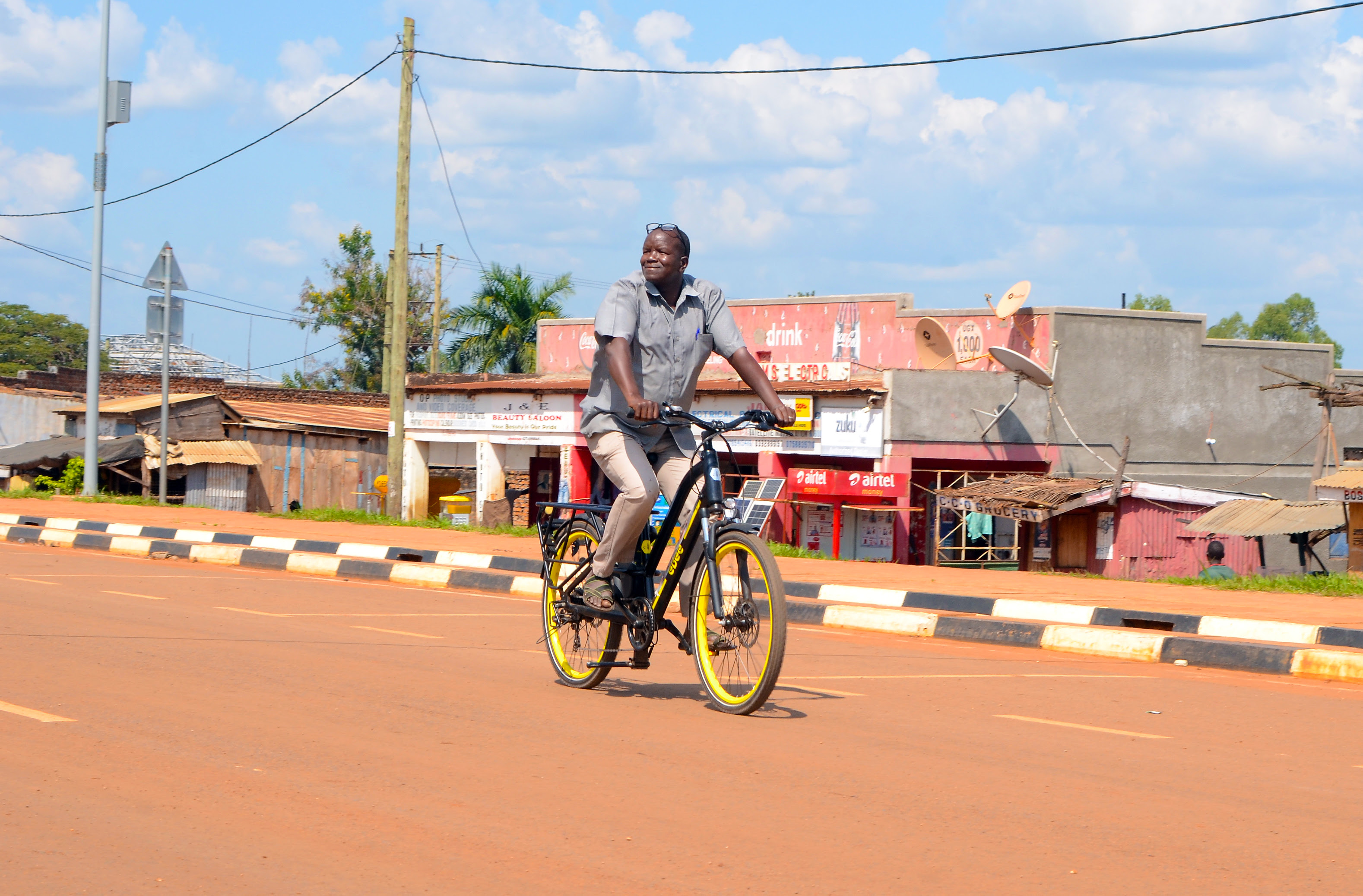 Farmer using an electric bicycle to support business activity